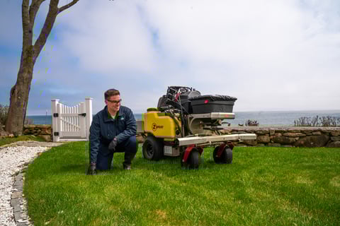local lawn care technician seeding lawn