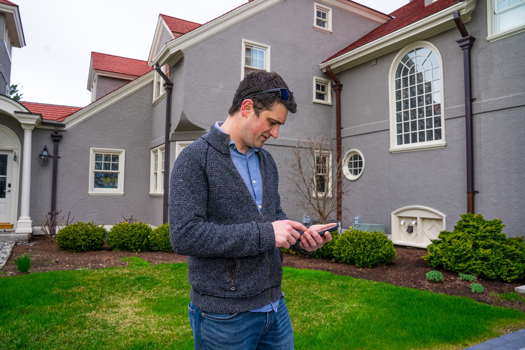 homeowner using google to diagnose lawn issues
