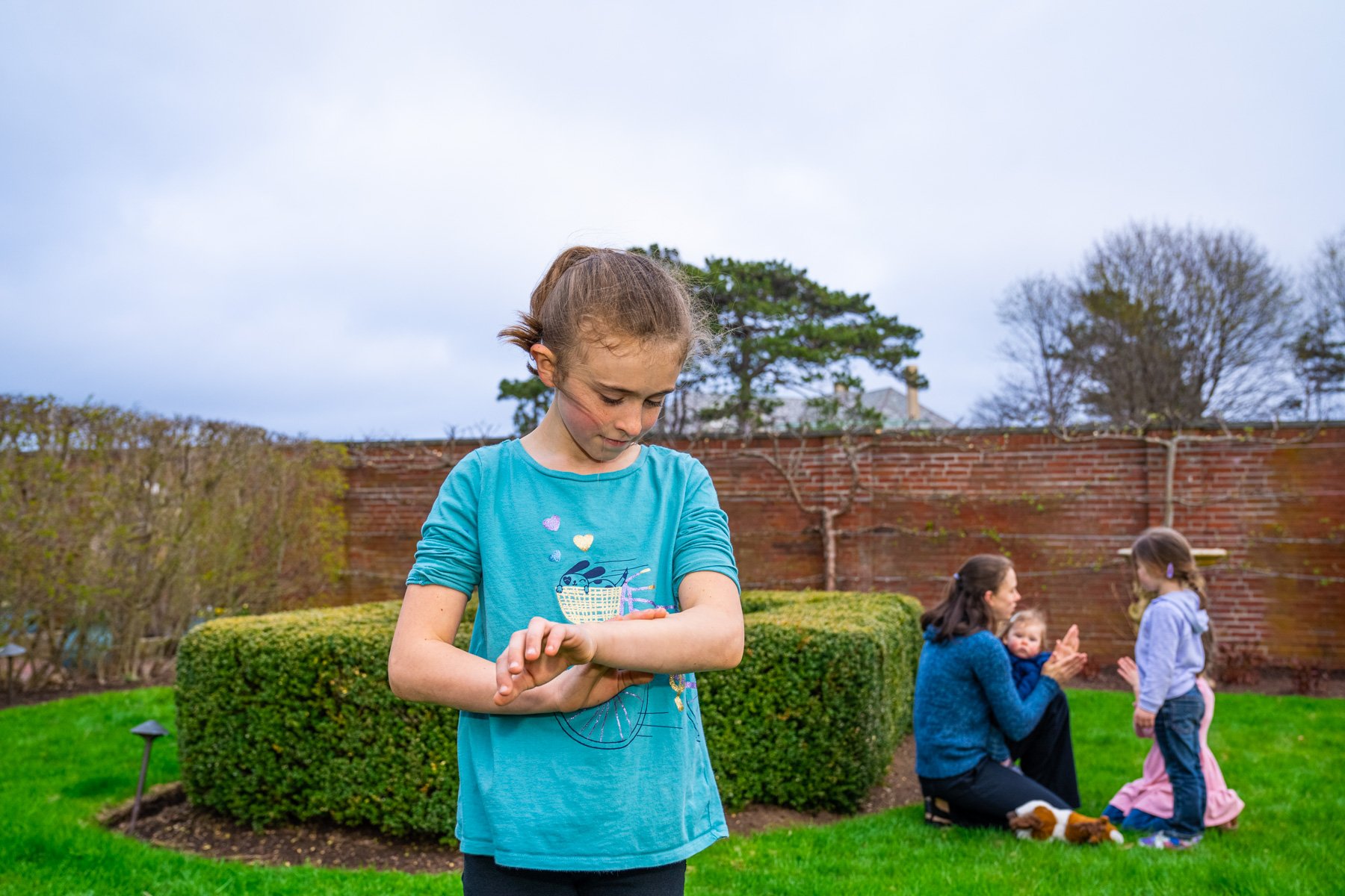 child inspecting a bite from a pest